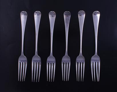 Six George III silver table forks