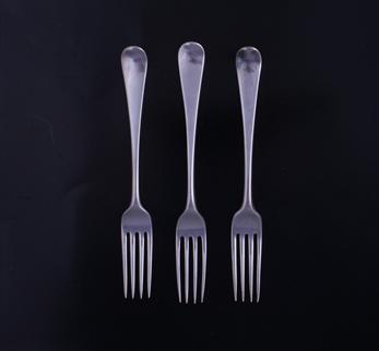 Three George III silver table forks