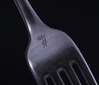 Three George III silver table forks