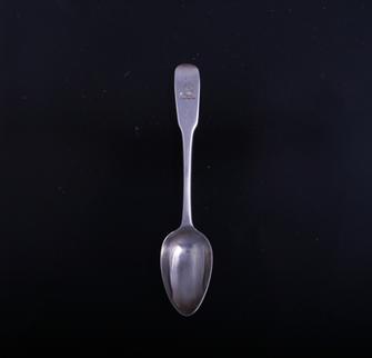 A George III sterling silver fiddle pattern teaspoon