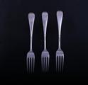 Three George V Hanoverian pattern sterling silver forks