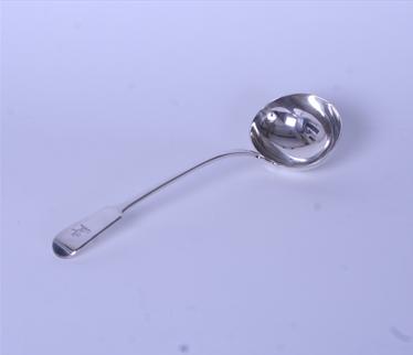 A George IV sterling silver fiddle pattern soup ladle