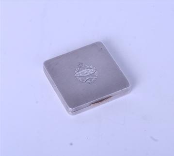 A sterling silver powder compact
