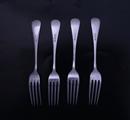 Four George V Old English pattern sterling silver dessert forks