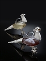 Pair of lifesize sterling silver and glass Pheasant claret jugs