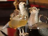 Pair of lifesize sterling silver and glass Pheasant claret jugs