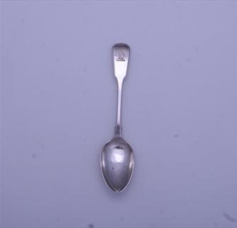 A George III sterling silver fiddle pattern teaspoon