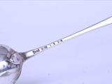 A pair of George III sterling silver serving spoons