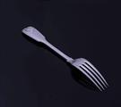 A Victorian fiddle, thread and shell pattern sterling silver table fork