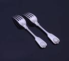 A pair of Victorian sterling silver fiddle, thread and shell pattern table forks