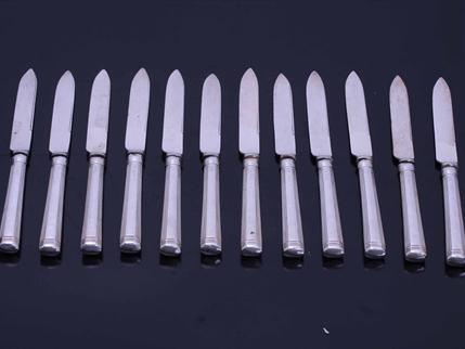 Set of 12 Edwardian silver handled fruit knives