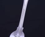 A Victorian fiddle and thread pattern sterling silver dessert fork