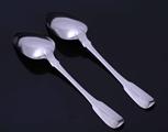 Pair of George III sterling silver fiddle pattern table spoons