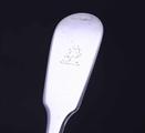 A William IV sterling silver fiddle pattern table spoon
