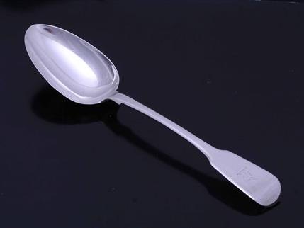 A George IV sterling silver fiddle pattern table spoon