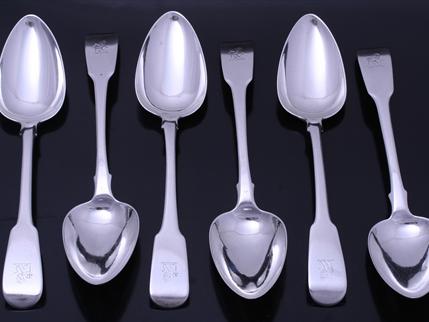 Set of six George III sterling silver fiddle pattern table spoons