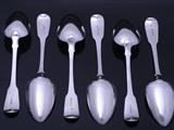 Set of six George III sterling silver fiddle pattern table spoons