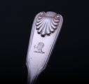 Set of four Victorian fiddle, thread and shell pattern sterling silver dessert forks