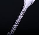 Set of four Victorian fiddle, thread and shell pattern sterling silver dessert forks