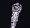 A set of four George IV King's pattern sterling silver dessert forks