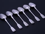 A set of six William IV sterling silver fiddle pattern table spoons