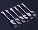 A set of six Regency Old English bead edge pattern sterling silver table forks