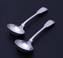 A pair of Victorian fiddle, thread and shell pattern sterling silver sauce ladles