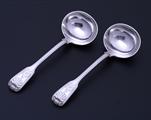 A pair of Victorian fiddle, thread and shell pattern sterling silver sauce ladles