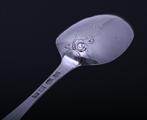 A rare pair of George III sterling silver Hanoverian pattern scrollback spoons