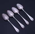 A set of four George III sterling silver table spoons