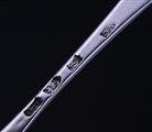A set of four George III sterling silver table spoons