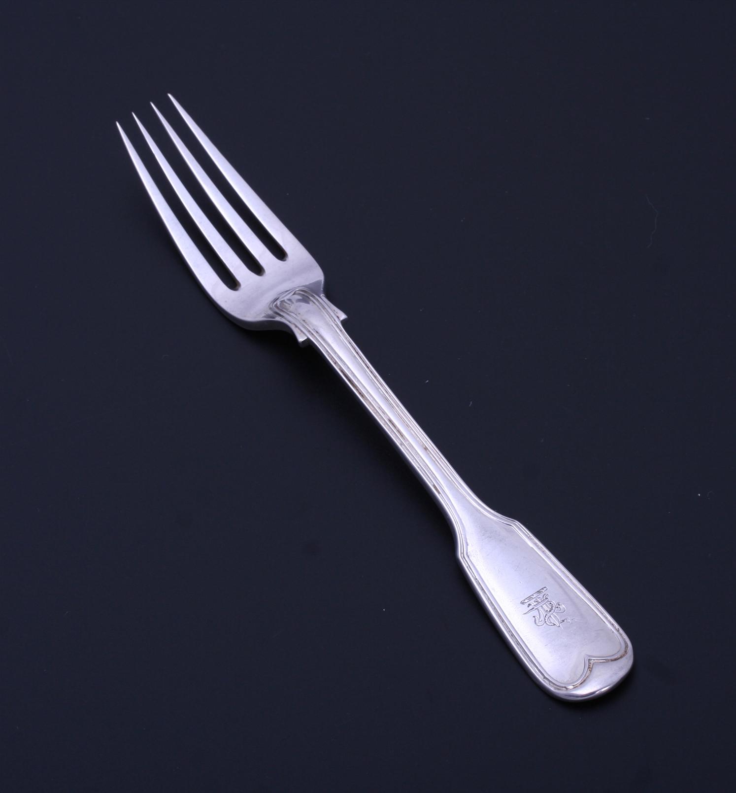A Victorian sterling silver fiddle and thread pattern dessert fork