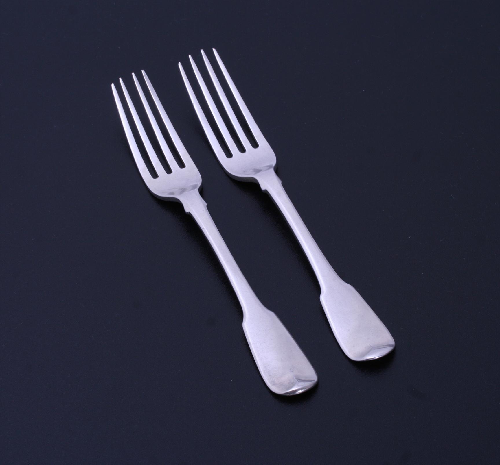 A pair of III sterling silver dessert forks