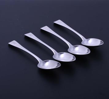 Set of four George IV sterling silver Old English pattern dessert spoons