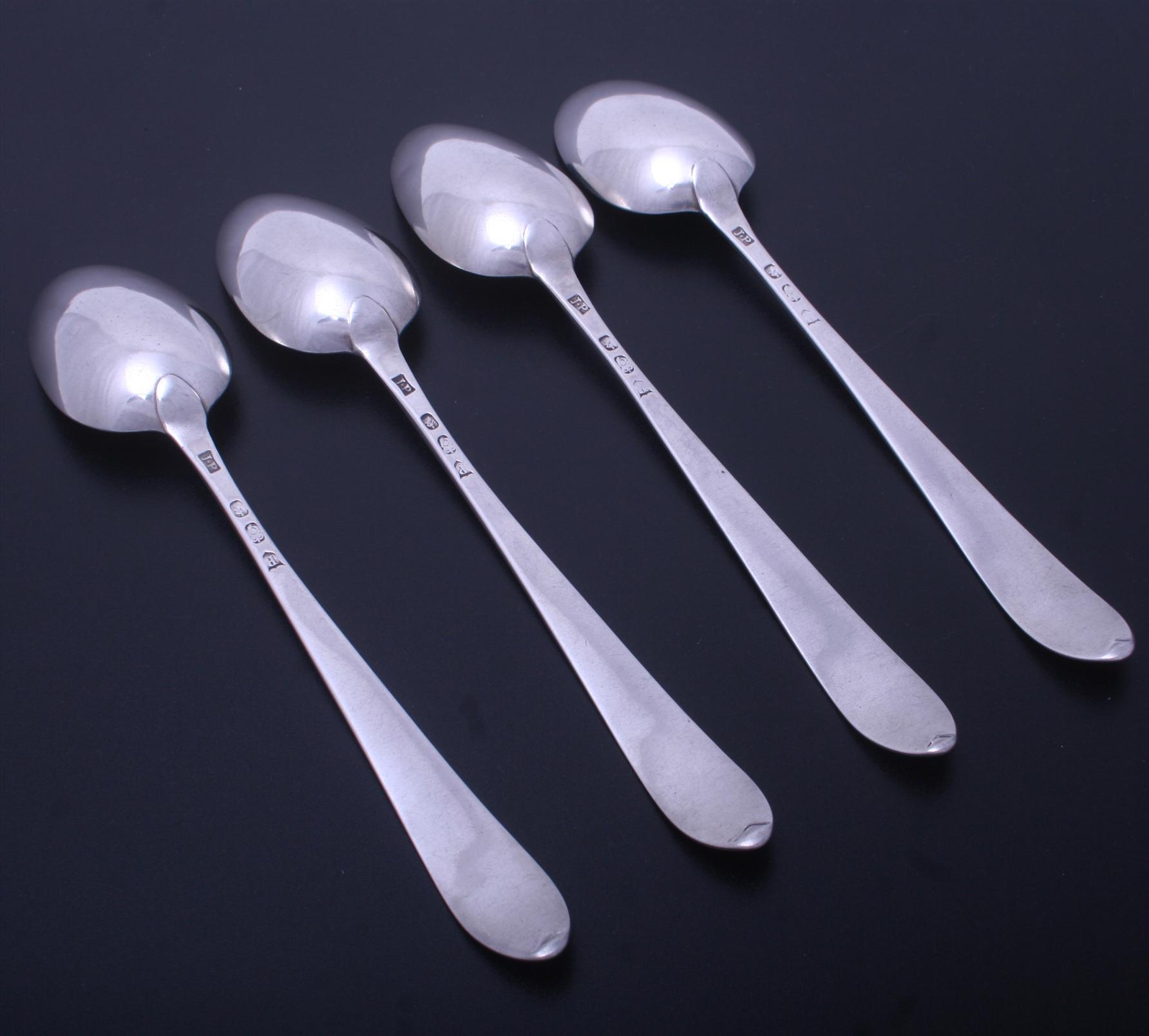 Set of four Irish III sterling silver table spoons