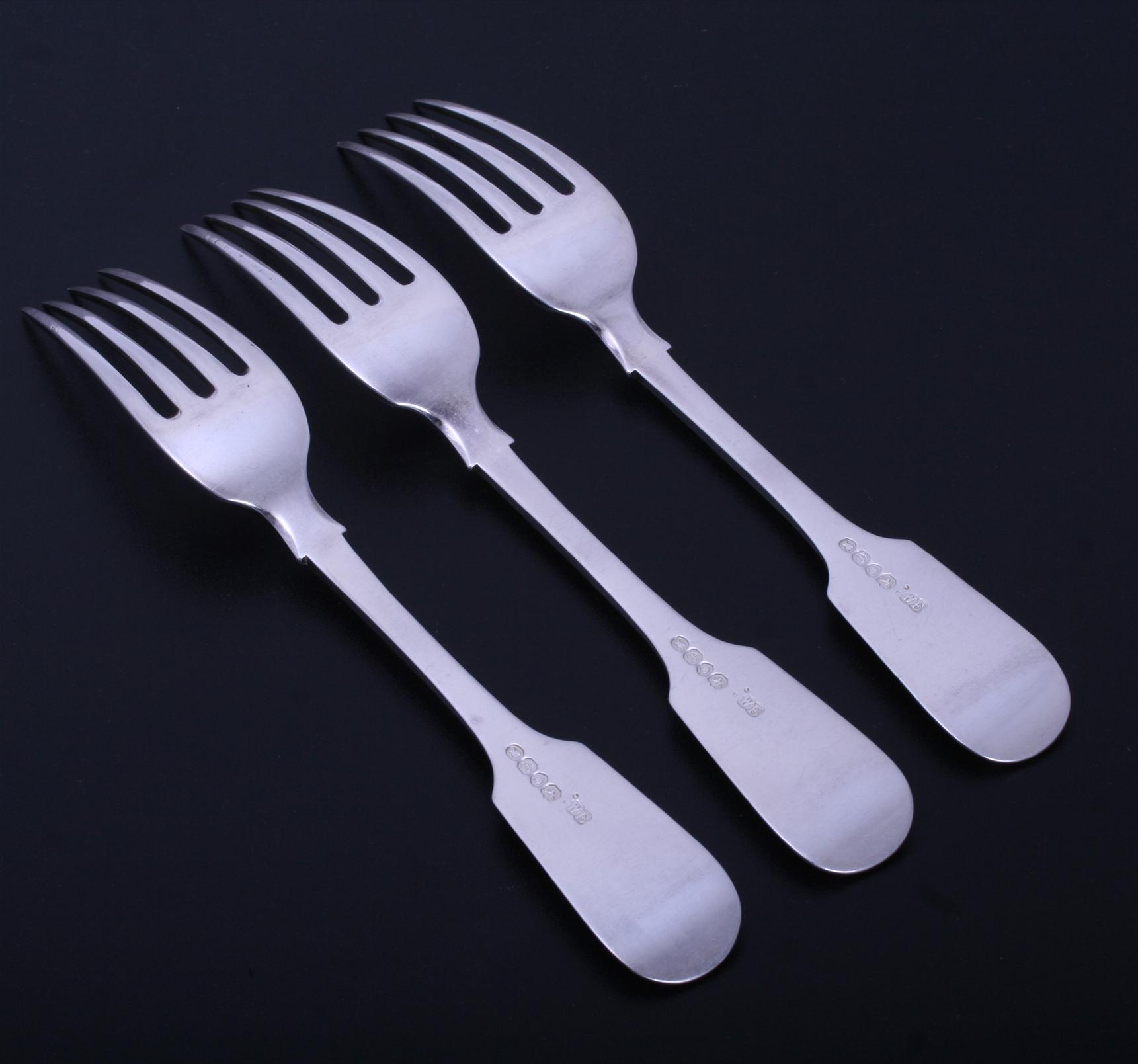 A set of three Victorian sterling silver table forks