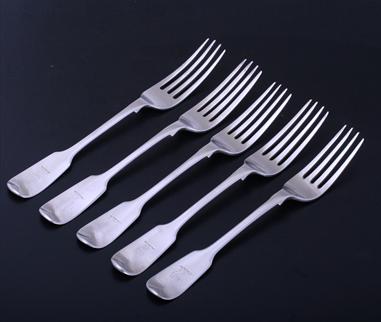 Matched set of five sterling silver fiddle pattern table forks