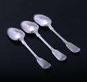 Three William IV sterling silver fiddle and husk pattern dessert spoons