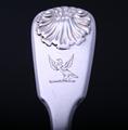 Three William IV sterling silver fiddle and husk pattern dessert spoons