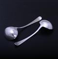 A pair of George III sterling silver Old English pattern sauce ladles