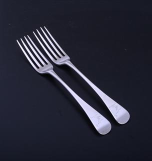 A pair of George III sterling silver Old English pattern table forks