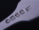 A pair of George IV sterling silver fiddle pattern table forks