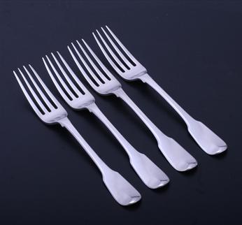 Set of four George III sterling silver fiddle pattern table forks