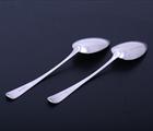 A matched pair of George III sterling silver Old English pattern table spoons