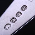 A matched pair of George III sterling silver Old English pattern table spoons