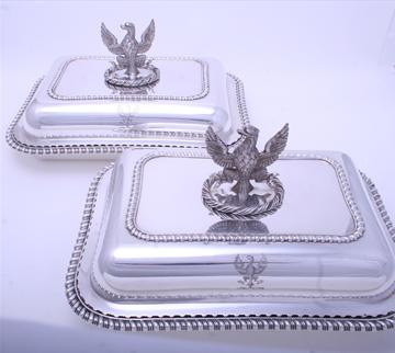 Pair Regency sterling silver entree dishes with armorial finials