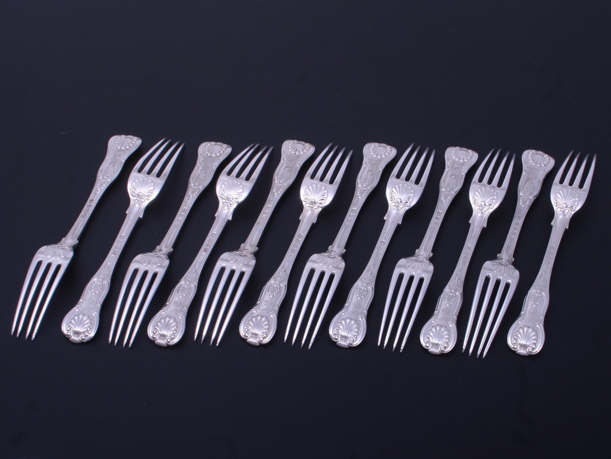 Twelve IV King's pattern sterling silver dessert forks