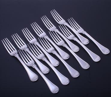 A fine set of twelve George III Old English thread pattern sterling silver table forks