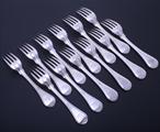 A fine set of twelve George III Old English thread pattern sterling silver table forks