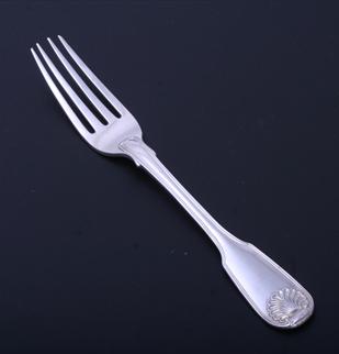 A William IV sterling silver fiddle, thread and shell pattern table fork